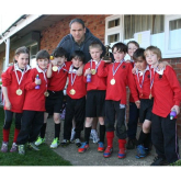 Local schoolchildren meet England rugby legend