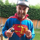 Plumbing tutor completes marathon in his back garden to raise money for charity