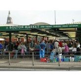 How do you become a market trader at Bolton Market?