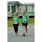 Husband and wife team from Shrewsbury caravan dealership enter the Shrewsbury half marathon