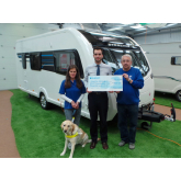 Shrewsbury caravan dealership and customers give Guide Dogs an £800 boost