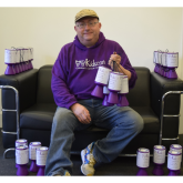 Kidscan Tin Collector celebrates £450K small change milestone during decade at Charity