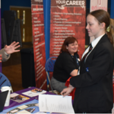 Employers meet with students at careers fair