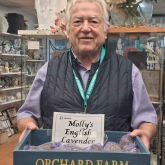 Shop volunteer makes lavender bags in wife’s memory