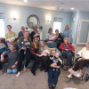 Once upon a time in Sutton Coldfield – local care home welcomes three generations for story time and massage