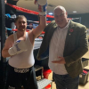 Security firm throws weight behind boxer