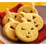 Orange pumpkin face cookies