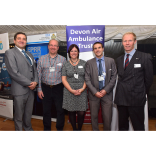 Bank Fines Celebrated by Minister at Air Ambulance Reception