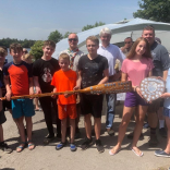 Royal Town's MP presents trophies at Sutton Coldfield Scouts raft race in Royal Sutton Park