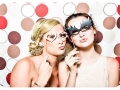 Girls-in-a-photo-booth-at-a-party