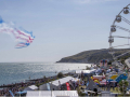 Visitors enjoying a popular seafront event during a day out in Eastbourne
