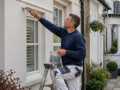 Property maintenance professional carrying out repair and maintenance work at a residential property in Eastbourne