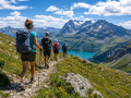 Travellers enjoying an outdoor activity holiday in a scenic mountain landscape