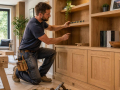 Carpenter installing timber features as part of a joinery project representing Carpenters in Eastbourne