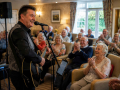 Professional entertainer performing live music for an audience in Eastbourne.