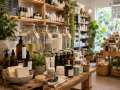 Natural Skin Care in Eastbourne products including botanical toiletries and refill bodycare displayed in a health store.