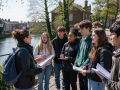 International students taking part in a Hosting Student Groups in Eastbourne educational visit led by a teacher.