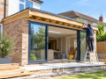 House Extension in Eastbourne with a builder working on a modern rear extension