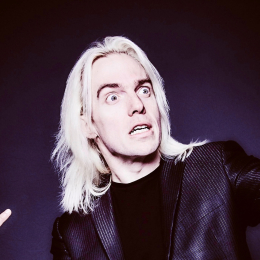 John Robertson plays with his Audience