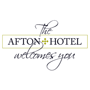 Logo of The Afton Hotel Eastbourne with elegant script and boxed serif text saying "welcomes you"